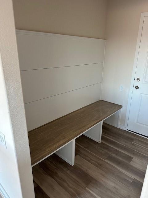 mudroom with dark hardwood / wood-style floors