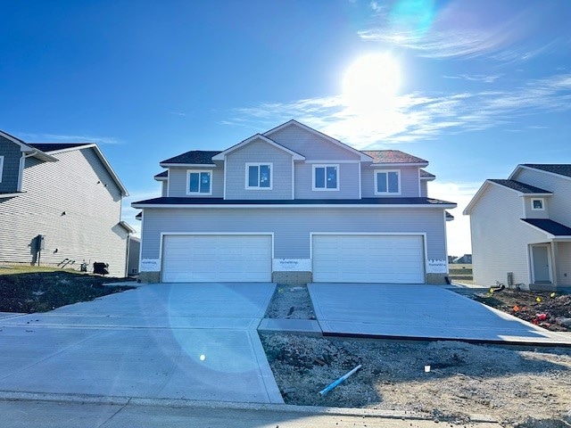 view of property with a garage