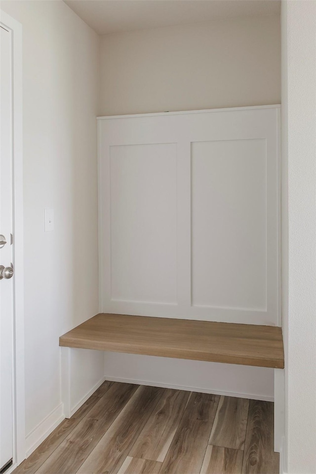 5130 Ella Ivy Ct, Van Meter, IA 50261 - mudroom with wood finished floors and baseboards