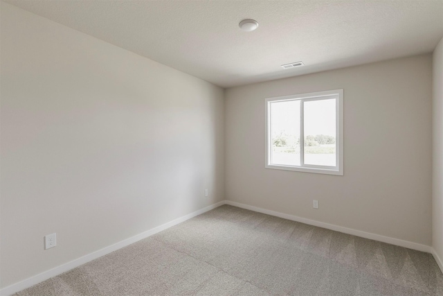 5130 Ella Ivy Ct, Van Meter, IA 50261 - carpeted spare room with baseboards