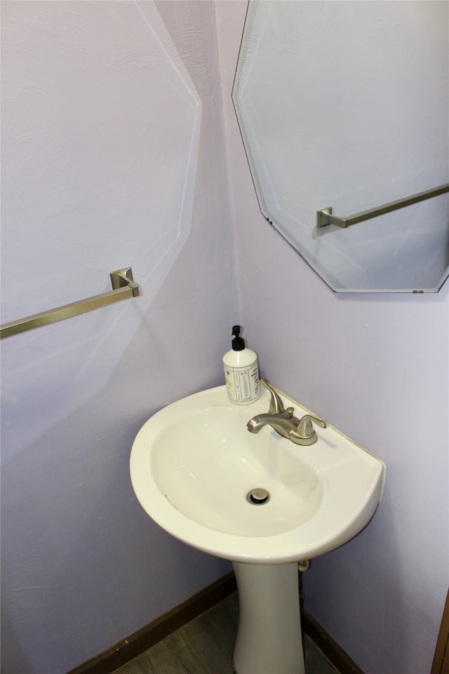 bathroom featuring hardwood / wood-style flooring