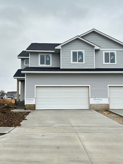 front facade with a garage