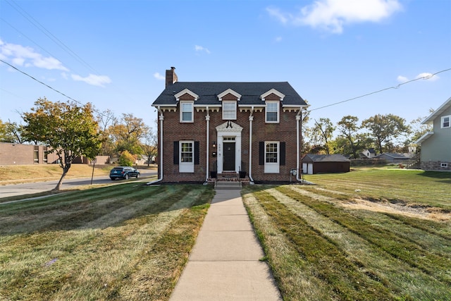 view of front of home with a front yard