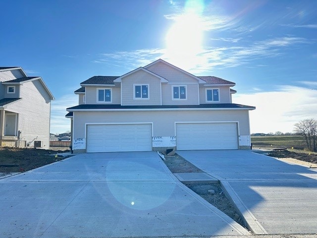 view of property with a garage