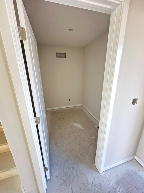 interior space with baseboards