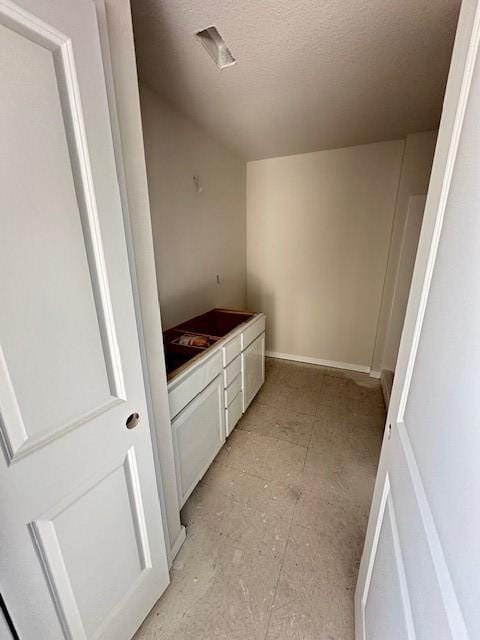 bathroom with a textured ceiling