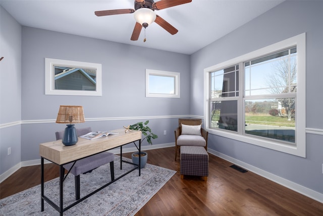 office space with dark hardwood / wood-style flooring and ceiling fan