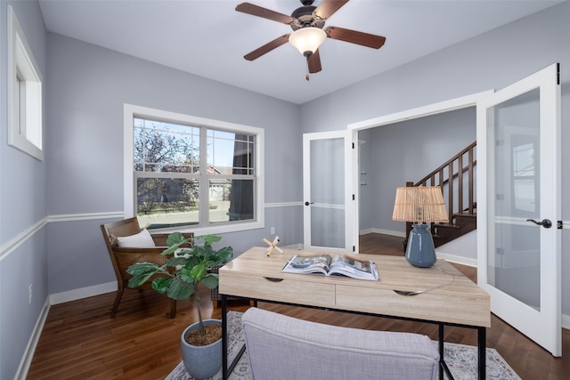 office area featuring a ceiling fan, wood finished floors, baseboards, and french doors