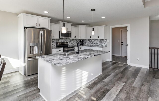 812 SE 15th St, Grimes, IA 50111 - kitchen with appliances with stainless steel finishes, a sink, dark wood-type flooring, tasteful backsplash, and baseboards