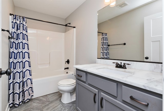 full bathroom with tile patterned floors, vanity, shower / bath combo, and toilet