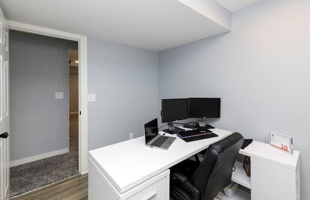 office area featuring dark wood-type flooring