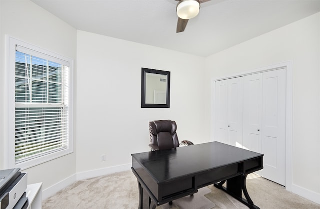 office with ceiling fan and light colored carpet