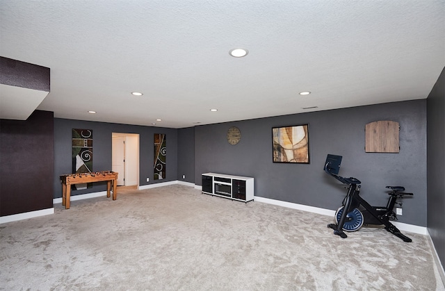 exercise area with carpet flooring