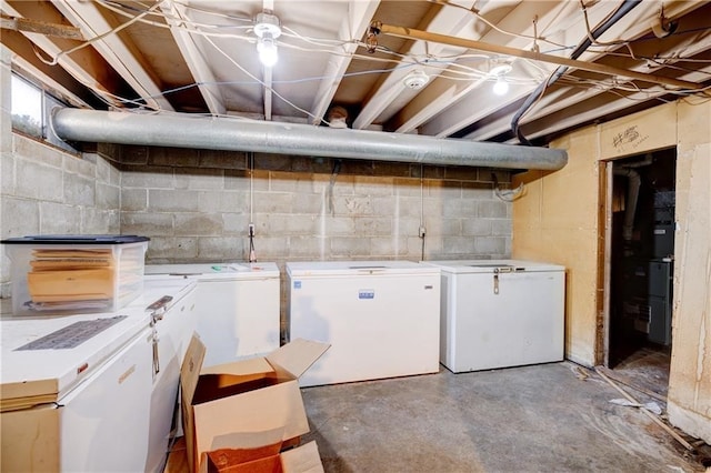 clothes washing area with independent washer and dryer