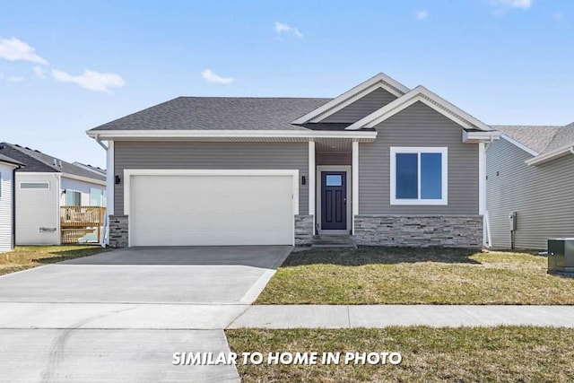 craftsman house with a front lawn, a garage, and cooling unit