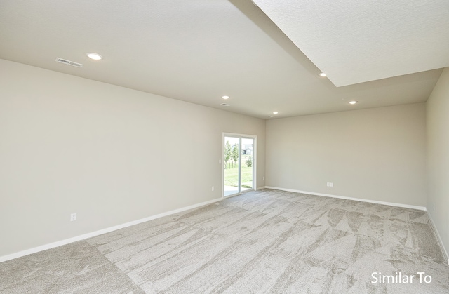 empty room with light colored carpet