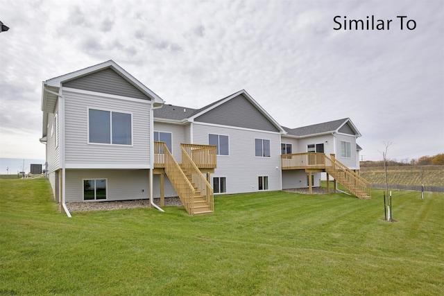 back of house featuring a wooden deck, a yard, and cooling unit