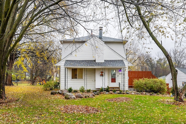 front facade with a front yard