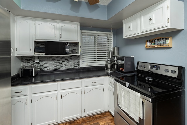 kitchen with white cabinetry, backsplash, ceiling fan, and appliances with stainless steel finishes