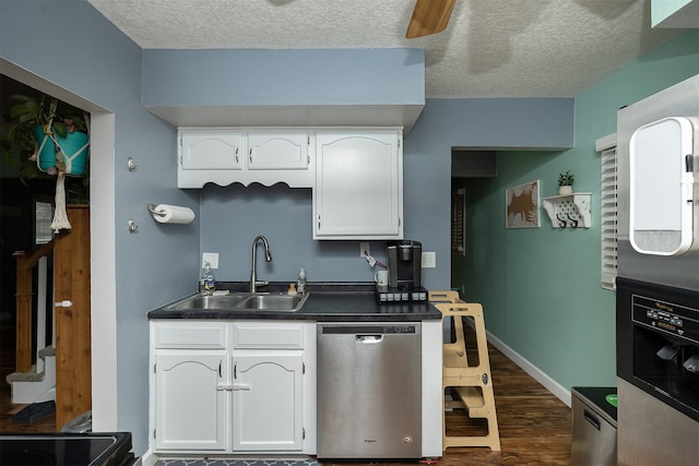 kitchen featuring sink, white cabinetry, dark hardwood / wood-style floors, a textured ceiling, and stainless steel dishwasher