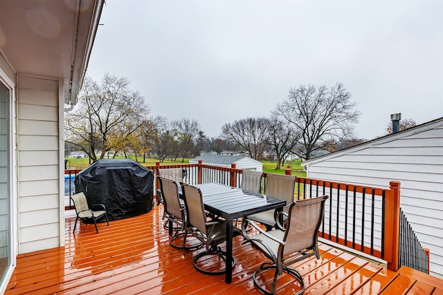 wooden deck featuring grilling area