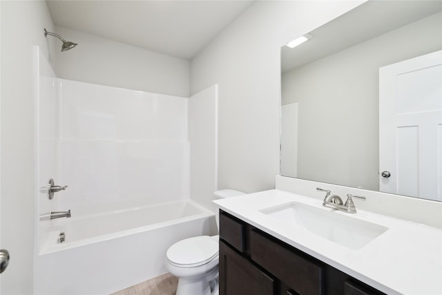 full bathroom with vanity, bathtub / shower combination, and toilet