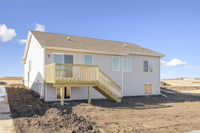 rear view of house with a deck