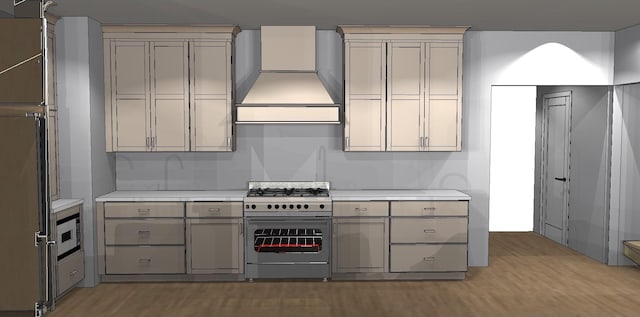 kitchen with wall chimney exhaust hood, light hardwood / wood-style flooring, stainless steel stove, and fridge