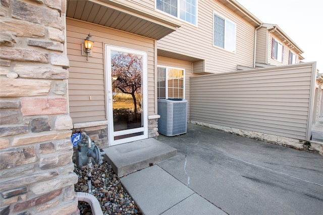 entrance to property with central AC unit