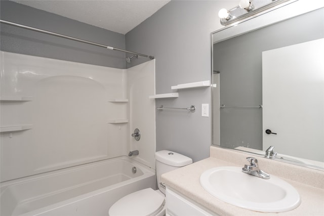 full bathroom featuring vanity, toilet, a textured ceiling, and bathing tub / shower combination