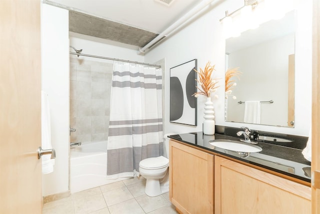 full bathroom with tile patterned flooring, vanity, shower / bath combination with curtain, and toilet