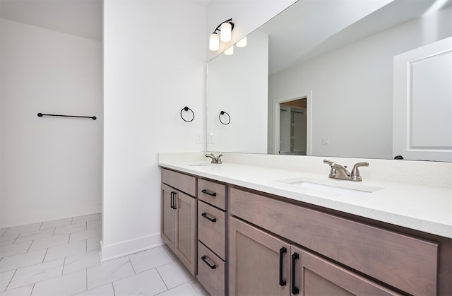 bathroom with tile patterned floors and vanity