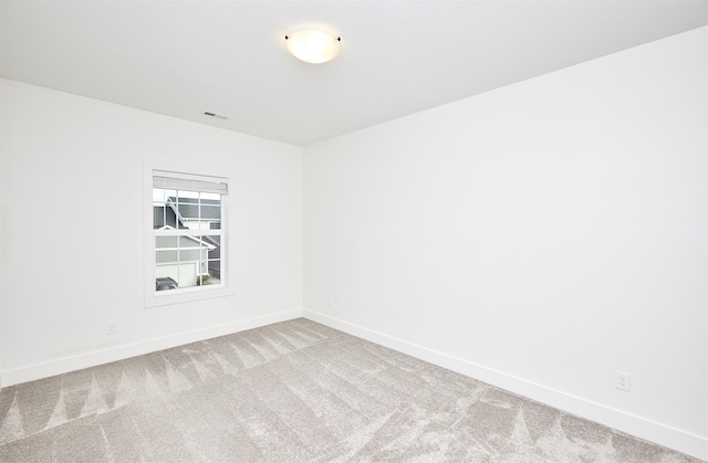 empty room featuring carpet floors