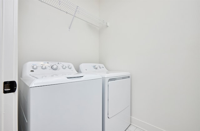 laundry room featuring washing machine and dryer