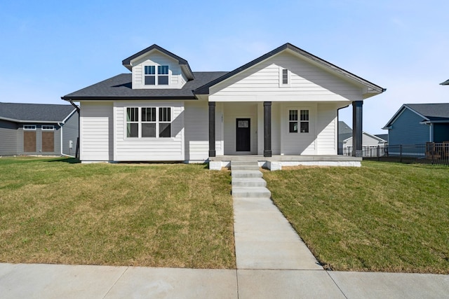 bungalow-style home featuring a front yard and a porch