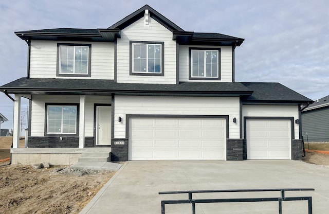 view of front of property with a garage