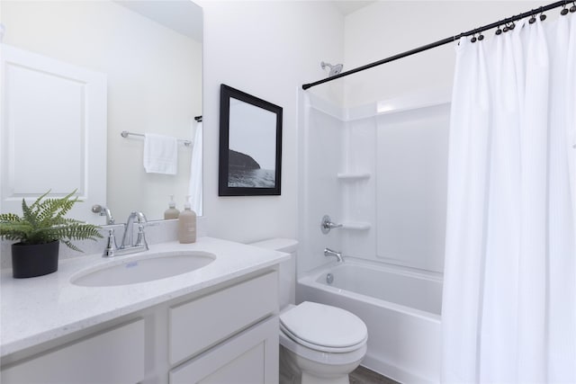 full bathroom featuring toilet, vanity, and shower / bath combo with shower curtain