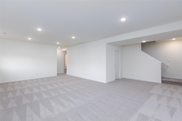 basement with light carpet