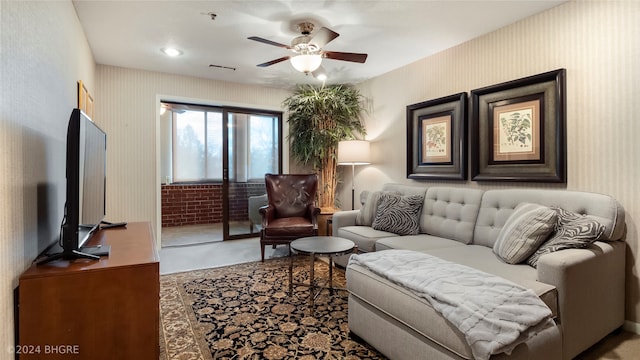 living room featuring ceiling fan