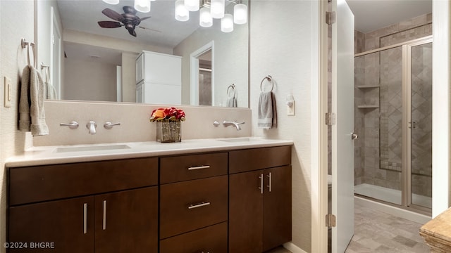 bathroom with decorative backsplash, vanity, walk in shower, and ceiling fan