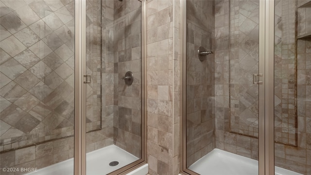 bathroom with an enclosed shower