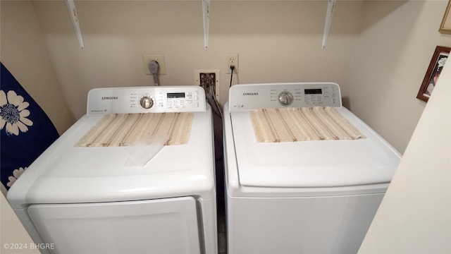 laundry area featuring independent washer and dryer