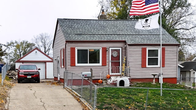 view of front of home featuring a garage and a front yard