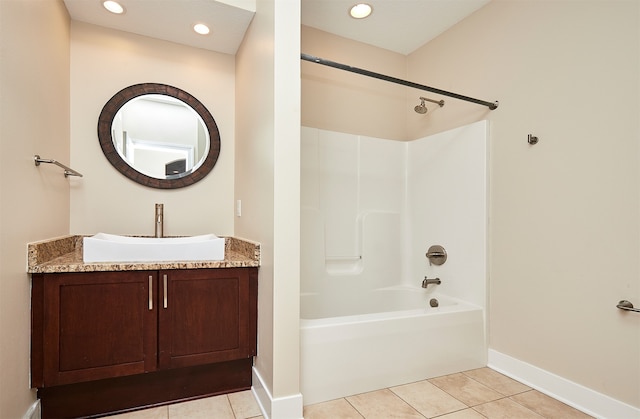 bathroom featuring tile patterned floors, vanity, and tub / shower combination