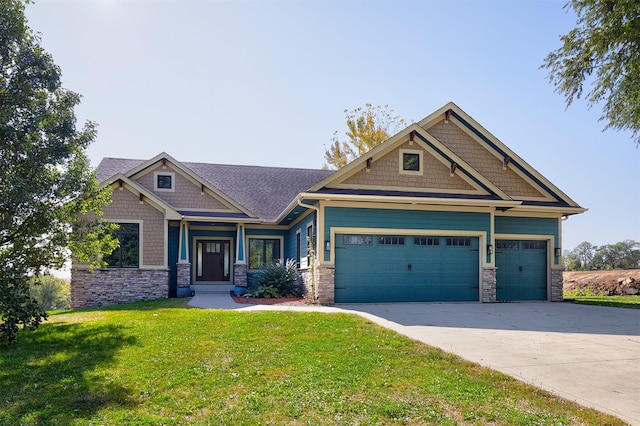 craftsman-style house with a front yard and a garage