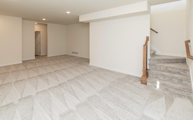 7011 Lincoln Cir, Johnston, IA 50131 - carpeted empty room with recessed lighting, stairway, and baseboards