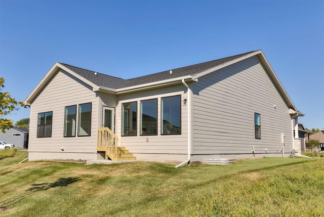 7011 Lincoln Cir, Johnston, IA 50131 - back of property featuring a yard