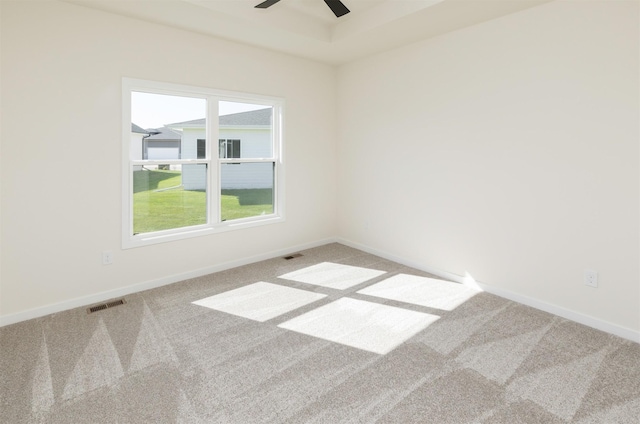 7011 Lincoln Cir, Johnston, IA 50131 - spare room featuring carpet, ceiling fan, and baseboards