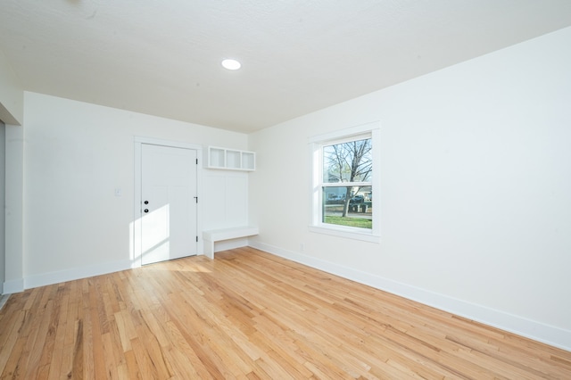 unfurnished room featuring light hardwood / wood-style flooring