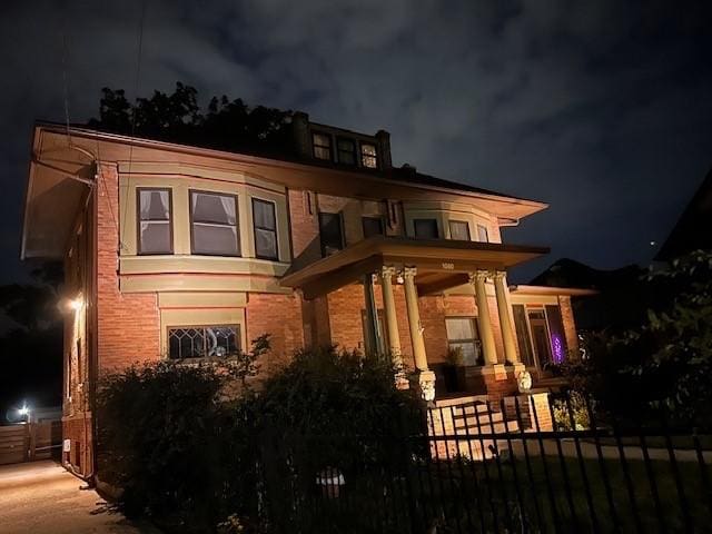 1080 31st St, Des Moines, IA 50311 - exterior space with covered porch and fence